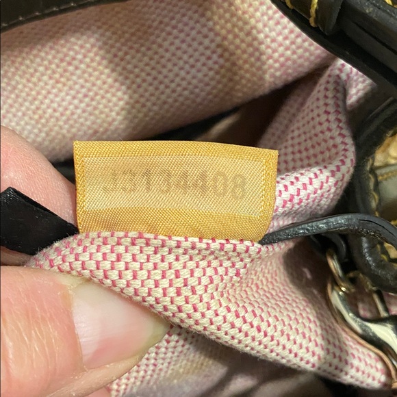 Dooney & Bourke Elegant Tan and Brown Women\'s Bag,  inside needs cleaning